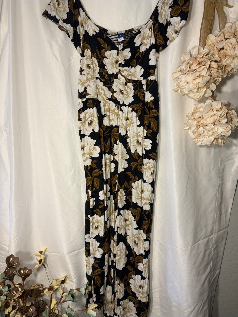 Old Navy Black Jumpsuit with Cream Floral and Brown Leaf Accents